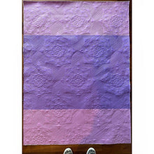 Load image into Gallery viewer, Cora's Star stitched out on a two-tone purple "wholecloth" quilt. Diagonal lines stitched between the stitched medallions.