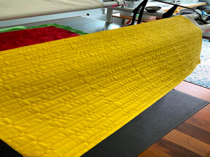 Love Code design is stitched out on a sample quilt at a block height of 15 inches.